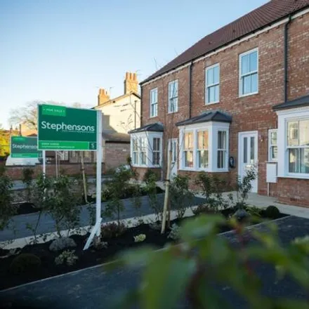 Buy this 3 bed townhouse on Glaisby Court in York, YO31 1AR