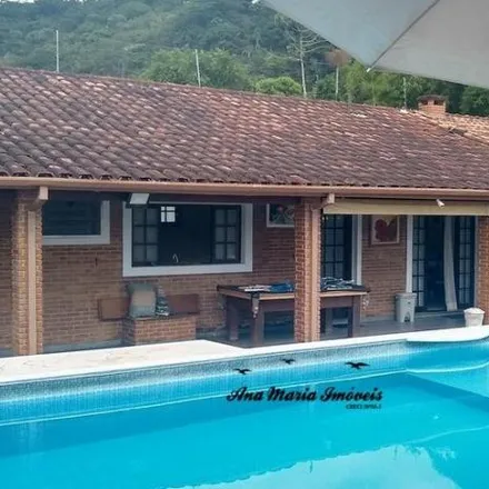 Buy this 4 bed house on Rua Tocantins in Massaguaçú, Caraguatatuba - SP