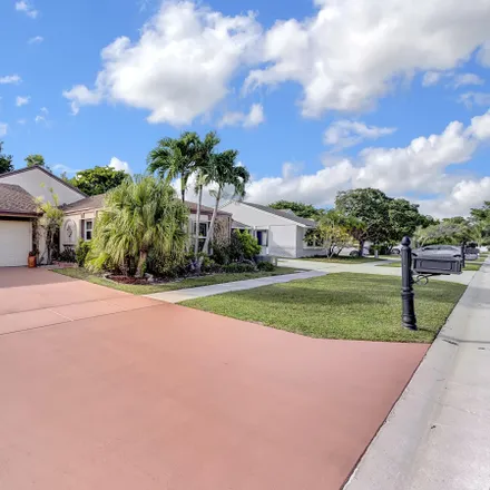 Rent this 4 bed house on 21599 Woodstream Terrace in Palm Beach County, FL 33428