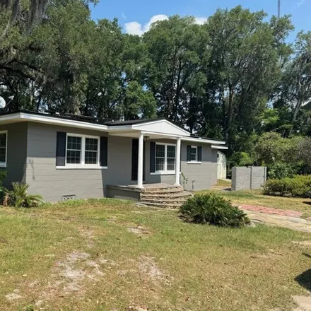 Rent this 4 bed house on 8305 Hogan Road in Hogan, Jacksonville