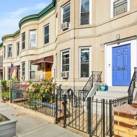 Buy this 5 bed townhouse on 19 East 10th Street in New York, NY 11218