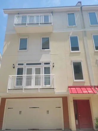 Rent this 3 bed townhouse on 7401 N Ocean Blvd