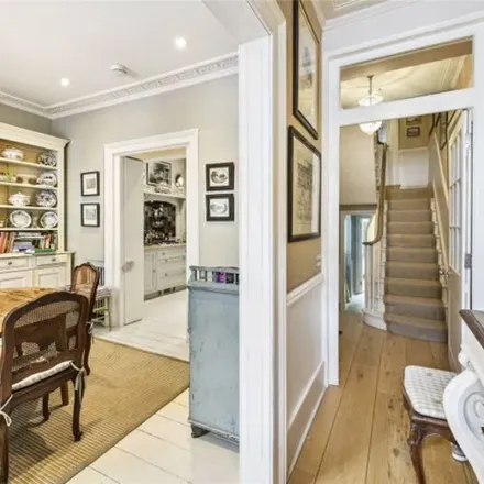 Rent this 4 bed townhouse on Cheyne Terrace in 77 Chelsea Manor Street, London