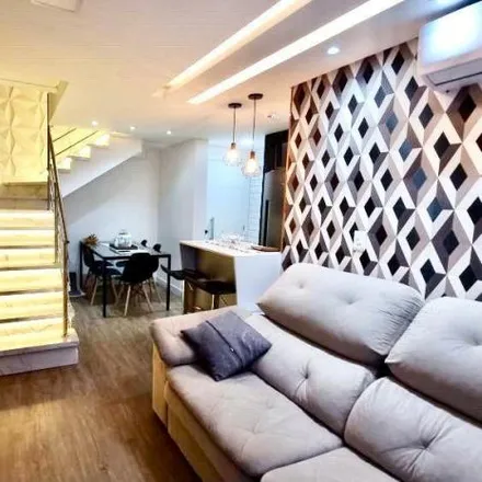 Buy this 3 bed apartment on Corpo de Bombeiros Militar Canasvieiras in Rodovia Armando Calil Bulos, Canasvieiras