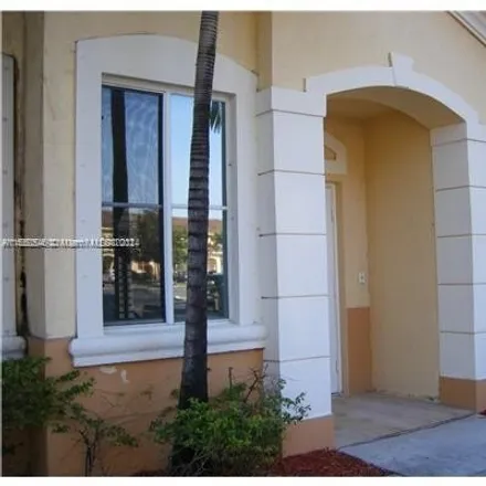 Buy this 3 bed townhouse on 6930 Northwest 177th Street in Miami-Dade County, FL 33015