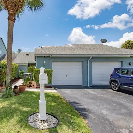 Buy this 2 bed house on 3951 Island Club Cir W in Lake Worth, Florida