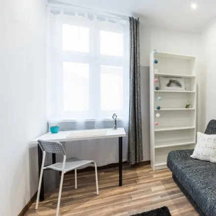 Rent this 6 bed room on Święty Marcin 67 in 61-806 Poznan, Poland