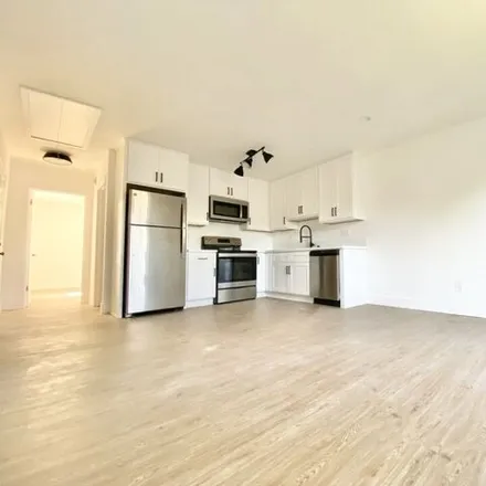 Rent this 3 bed house on 1958 New England Street in Los Angeles, CA 90007