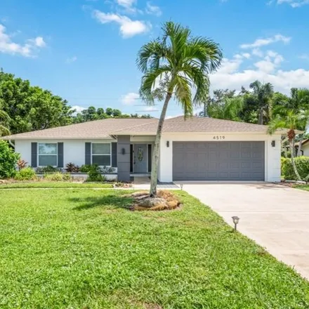 Rent this 3 bed house on 4521 Lakewood Boulevard in East Naples, FL 34112