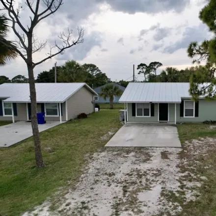 Image 2 - 1329 22nd Avenue Southwest, Florida Ridge, FL 32962, USA - House for sale