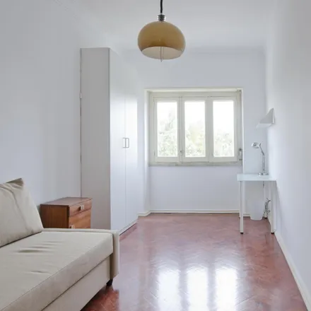 Rent this 3 bed room on Rua Ramalho Ortigão 45 in 1070-230 Lisbon, Portugal