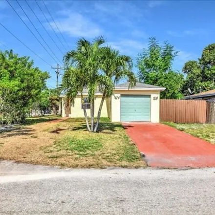 Buy this 4 bed house on 1516 Northwest 8th Street in Fort Lauderdale, FL 33311