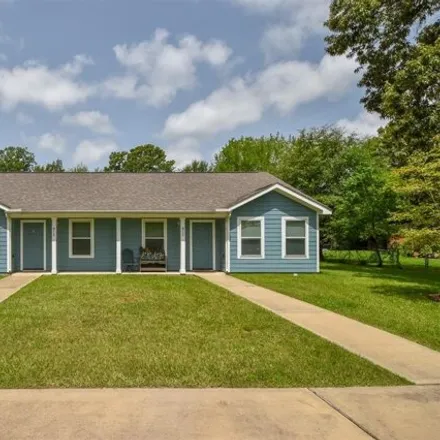 Rent this 2 bed house on 870 Maple Avenue in Cleveland, TX 77327