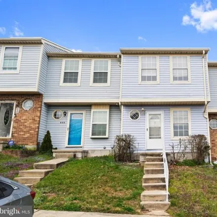 Buy this 2 bed townhouse on 802 West Spring Meadow Court in Woodbridge Center, Edgewood