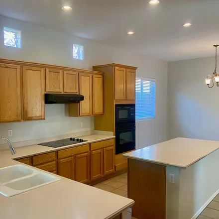 Rent this 4 bed apartment on 3534 West Rushmore Drive in Phoenix, AZ 85086