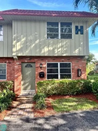 Buy this 2 bed townhouse on 77 Northeast 20th Court in Wilton Manors, FL 33305