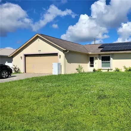 Buy this 3 bed house on 868 Kennwood Terrace Northwest in Port Charlotte, FL 33948