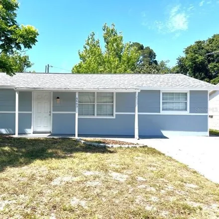 Rent this 4 bed house on 6375 Butte Avenue in Elfers, FL 34653