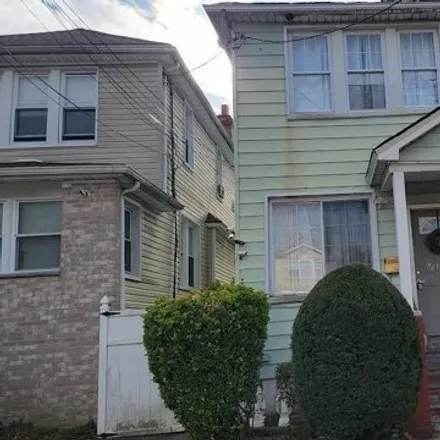 Buy this 3 bed house on 218-20 112th Avenue in New York, NY 11429