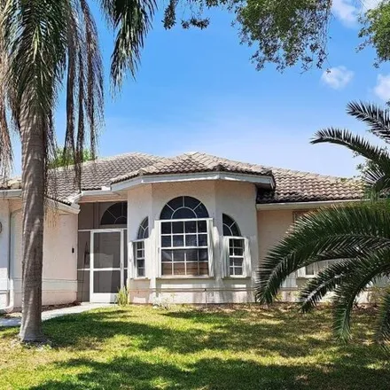 Rent this 3 bed house on 924 Westwinds Boulevard in Tarpon Springs, FL 34689