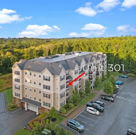 Buy this 2 bed condo on Daniel R. Healy Memorial Swimming Pool in Acadia Lane, Exeter