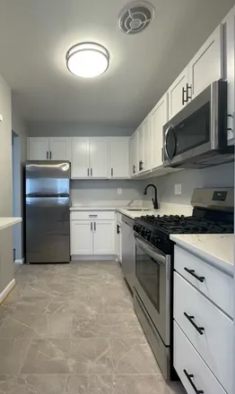 Rent this 2 bed apartment on 4020 Washington Blvd