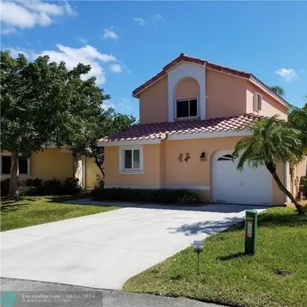 Rent this 3 bed house on 1106 Watermark Street in Dania Beach, FL 33004