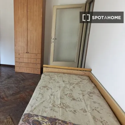 Rent this 2 bed room on Via Fratelli Rosselli 2 in 20139 Milan MI, Italy