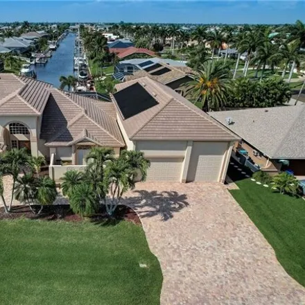 Buy this 4 bed house on 907 Southwest 51st Terrace in Cape Coral, FL 33914