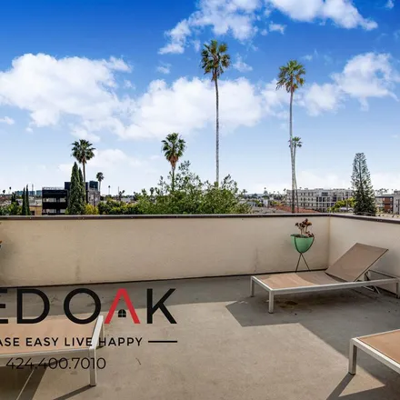 Rent this 3 bed apartment on 6411 La Mirada Avenue in Los Angeles, CA 90038