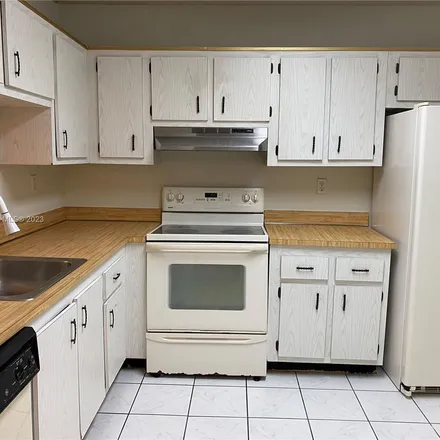 Rent this 1 bed apartment on 101 Belmont Lane in North Lauderdale, FL 33068