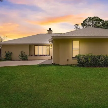 Buy this 3 bed house on 322 Peggy Circle Northeast in Palm Bay, FL 32907