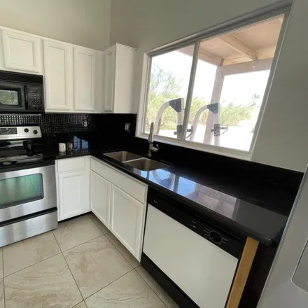 Rent this 3 bed house on 3505 West Via Del Sol Drive in Glendale, AZ 85310