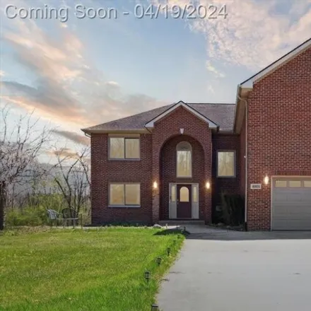 Buy this 5 bed house on 3942 East Huron River Drive in Ann Arbor Charter Township, MI 48105