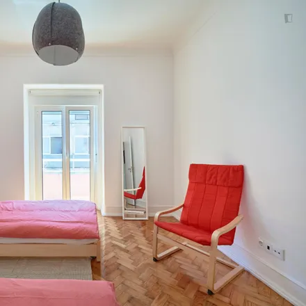 Rent this 5 bed room on Rua da Beneficência 40 in 1600-021 Lisbon, Portugal