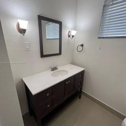 Rent this 3 bed apartment on 7250 Southwest 22nd Street in Miami-Dade County, FL 33155