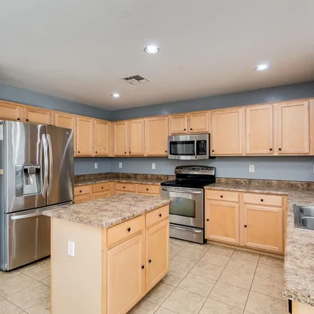 Rent this 4 bed apartment on 9903 West Riverside Avenue in Phoenix, AZ 85353