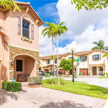 Buy this 4 bed townhouse on 2101 Northwest 34th Terrace in Coconut Creek, FL 33066