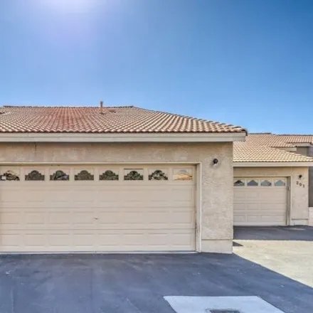 Buy this 2 bed townhouse on 299 North Cimarron Road in Las Vegas, NV 89145