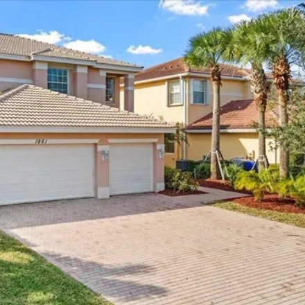 Buy this 5 bed house on 1867 Grey Falcon Circle Southwest in Florida Ridge, FL 32962