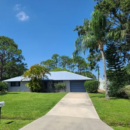 Rent this 3 bed house on 572 Avondale Rd NE in Palm Bay, Florida