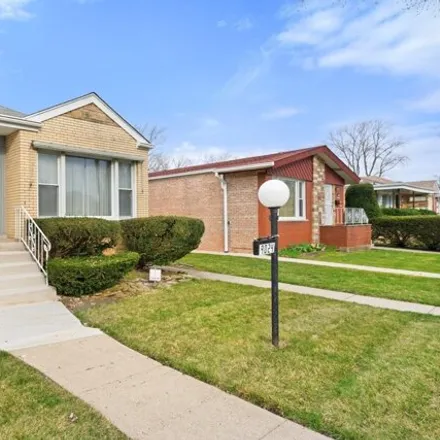 Buy this 3 bed house on 9024 South Luella Avenue in Chicago, IL 60617