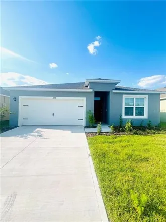 Rent this 4 bed house on Sweetwater Club Boulevard in Polk County, FL