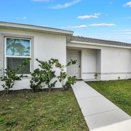 Buy this 3 bed house on 3262 Warsaw Avenue Southeast in Palm Bay, FL 32909