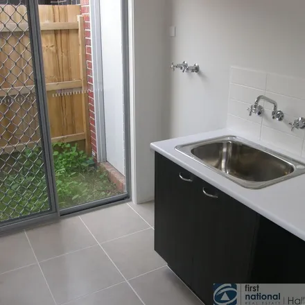 Rent this 4 bed apartment on Kaimas Way in Dandenong VIC 3175, Australia