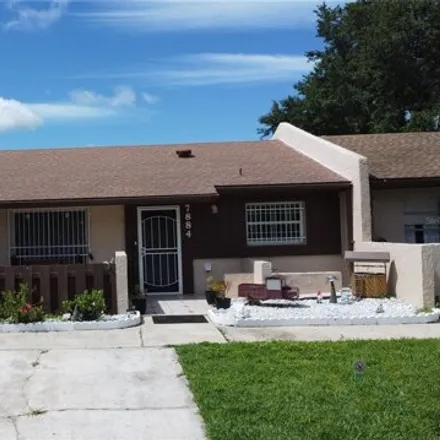 Buy this 2 bed townhouse on 7884 Guardsmen St in Orlando, Florida