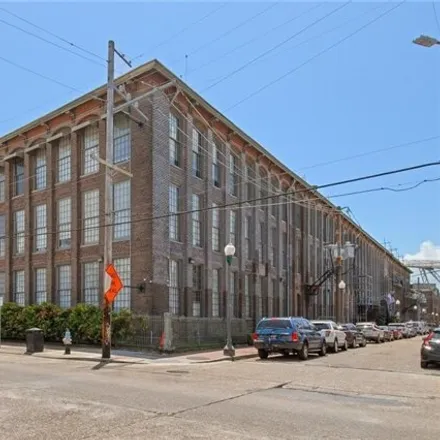 Rent this 2 bed condo on 920 Poeyfarre Street in New Orleans, LA 70130