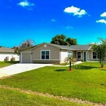 Buy this 4 bed house on 709 Harland Court in Poinciana, FL 34758