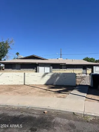 Buy this studio house on 1061 North July Circle in Mesa, AZ 85203