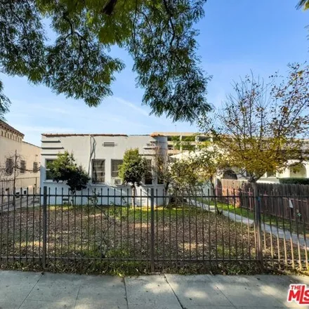 Buy this 4 bed house on 3513 S Bronson Ave in Los Angeles, California